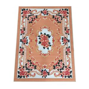 Krásny oranžový koberec s kvetinovým vzorom