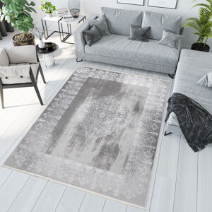 Moderní koberec v šedé barvě s orientálním vzorem v bílé barvě